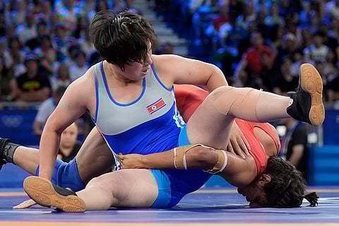 Women's freestyle 68kg wrestling quarterfinal between Nisha Dahiya and Sol Gum Pak